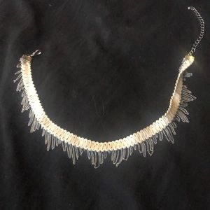 White choker necklace with stylish silver trim